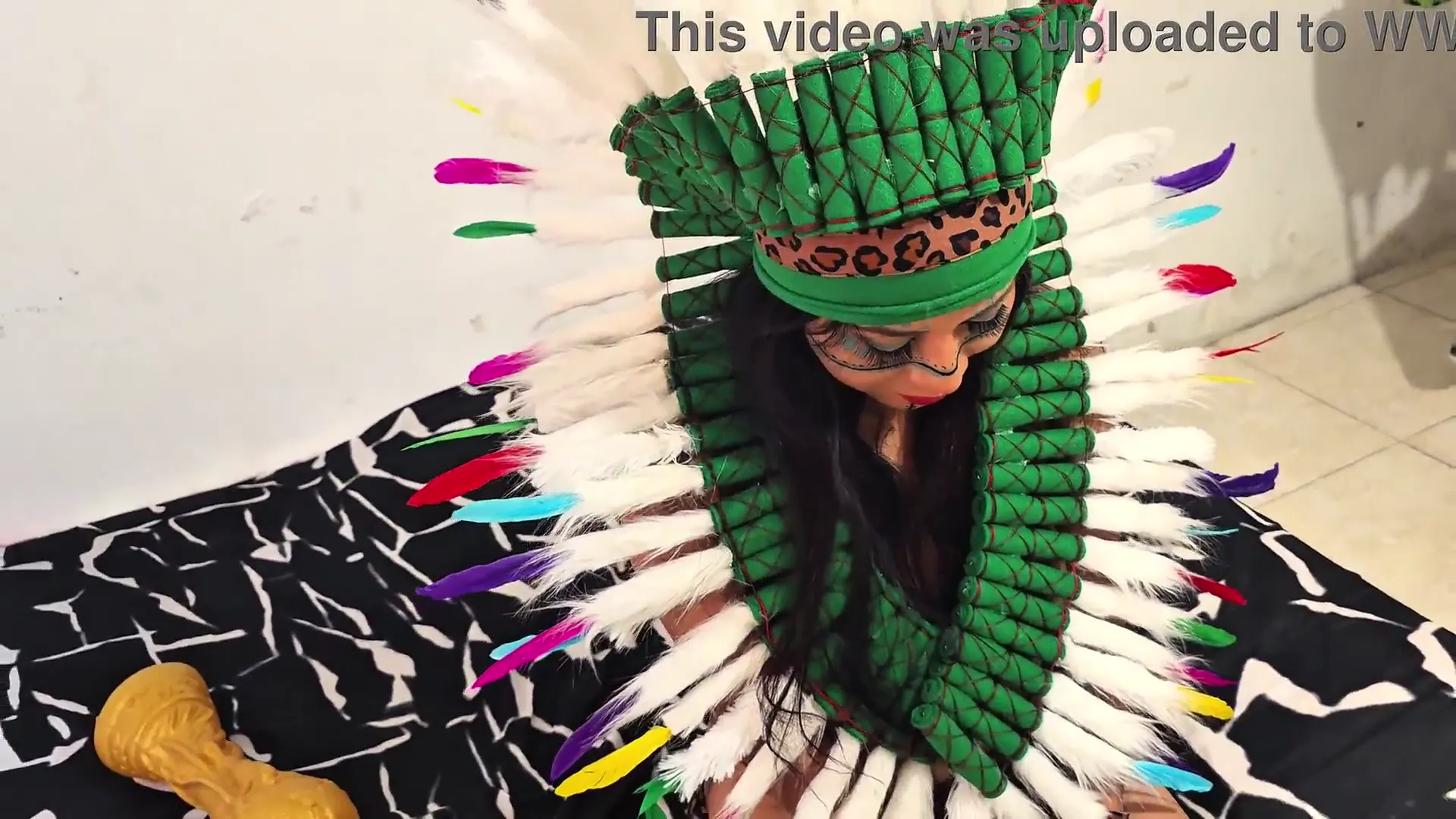Moment at 04:01 in Extremely wild sexy tribal girl wearing traditional loincloth and giant feather crown gets dirty and fucked hard by Colombian studs in an insane hot sexual encounter after World Cup Part 1