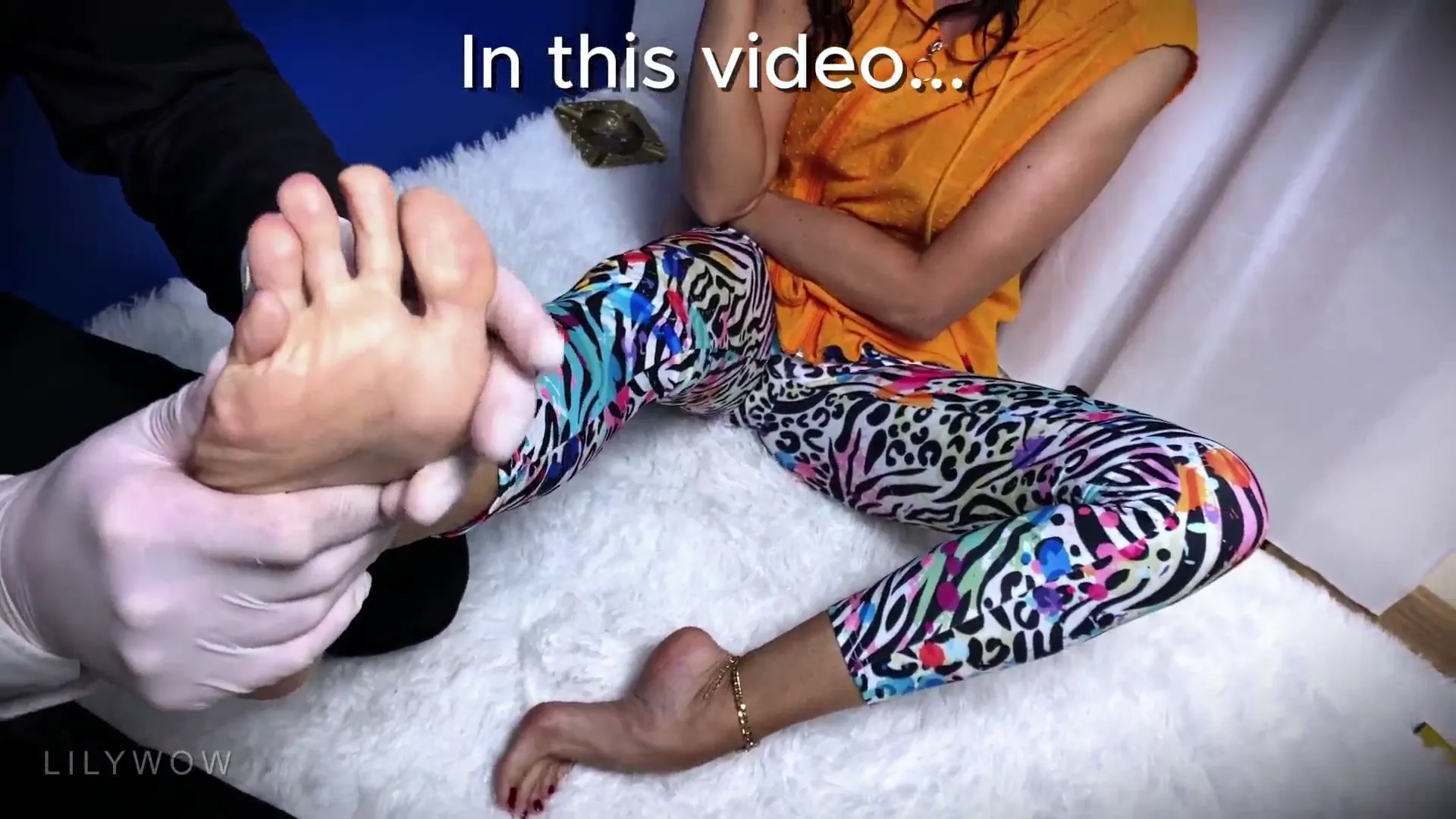 Moment at 01:05 in Bare Feet in Leggings Massage, High Heels, ASMR, Sexy Legs, MILF Feet, Foot Massage
