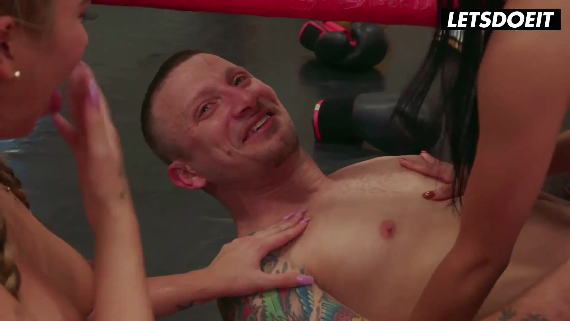 Moment at 03:34 in Four Naked Cunts Share One Cock in Boxing Ring... Taking Turns Fucking