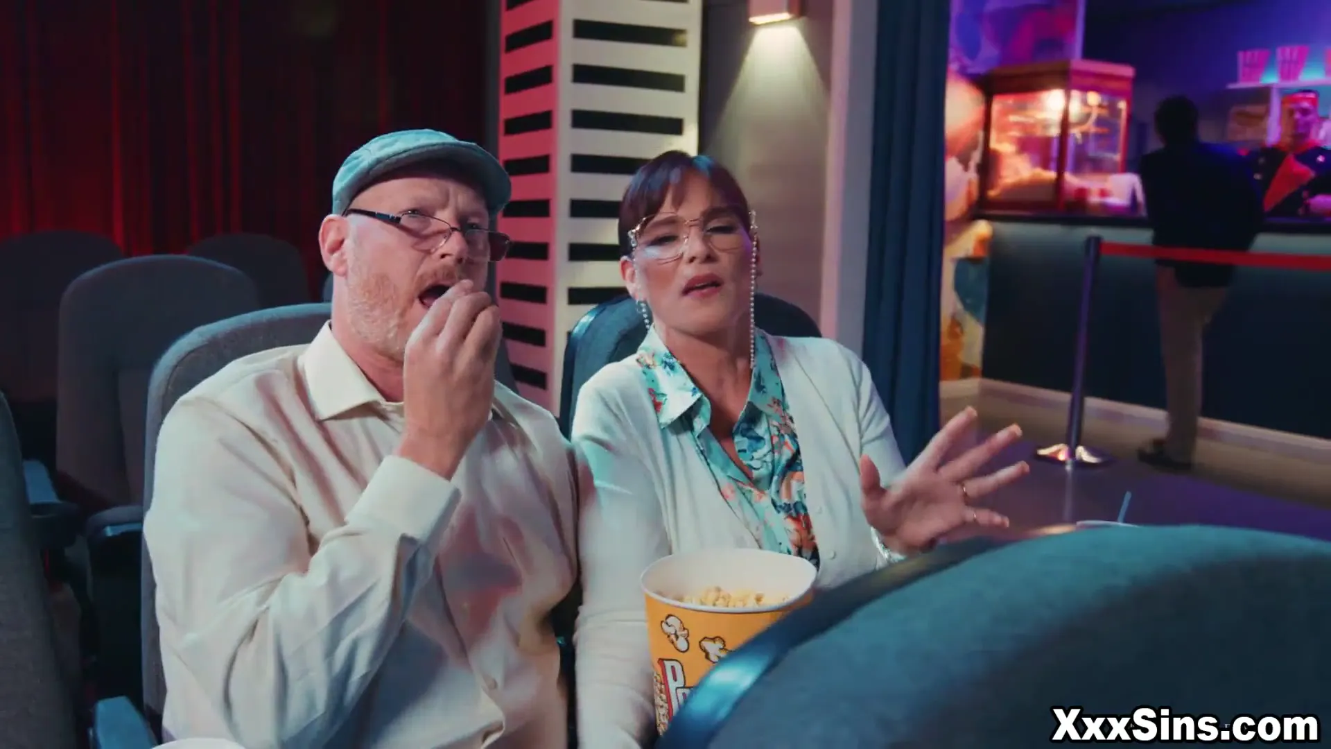 Moment at 01:33 in Older couple Syren DeMer and Dick Chibbles Athena disturbed by a teenager couple Athena Faris and Ricky Spanish having sex in cinema!